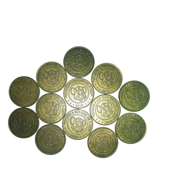Chuck E Cheese Arcade Tokens Lot of 13 - 2010 Circulated - Picture 1 of 2